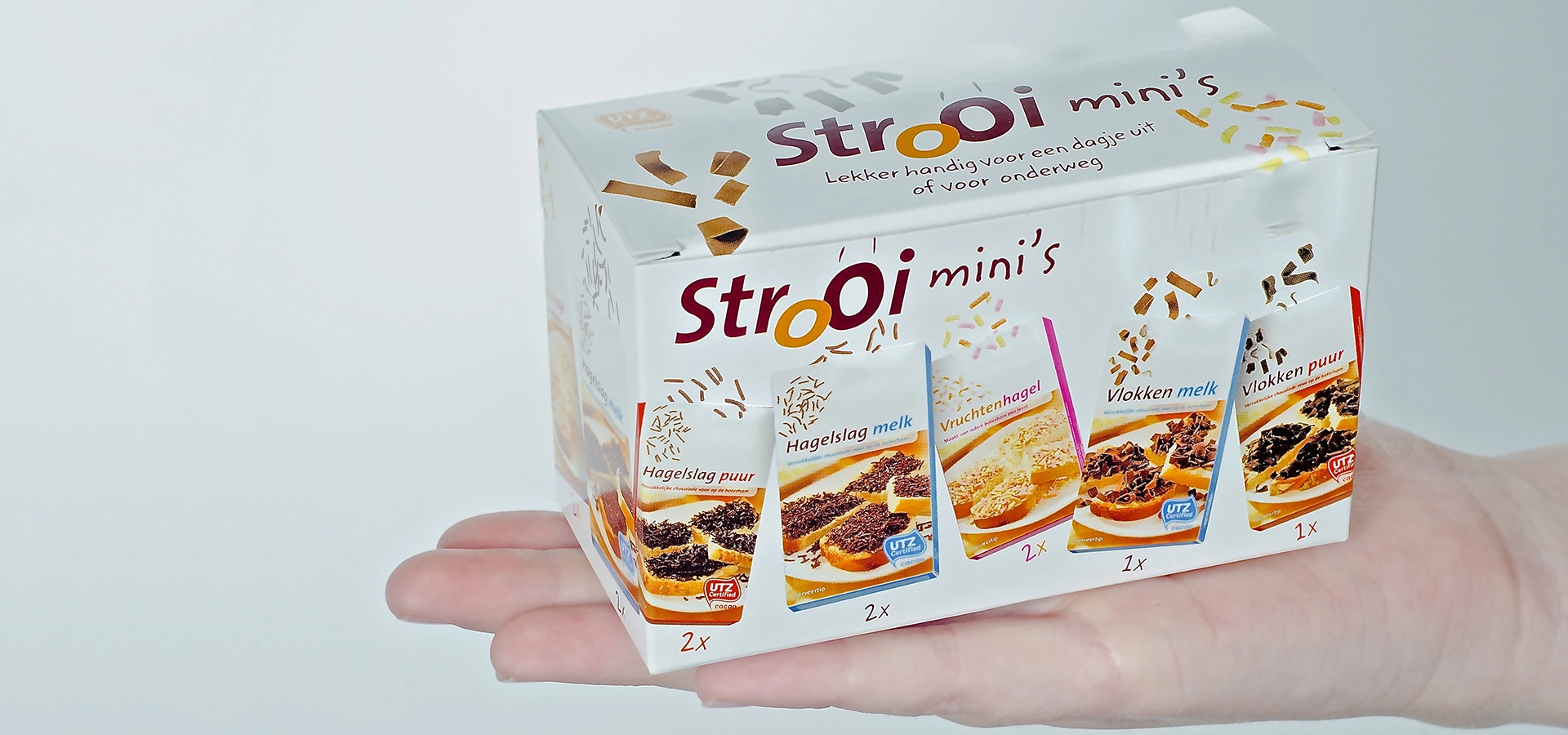 Cardboard mini-dispenser under own retail brand